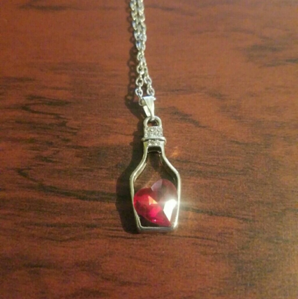 Bottle with heart necklaces